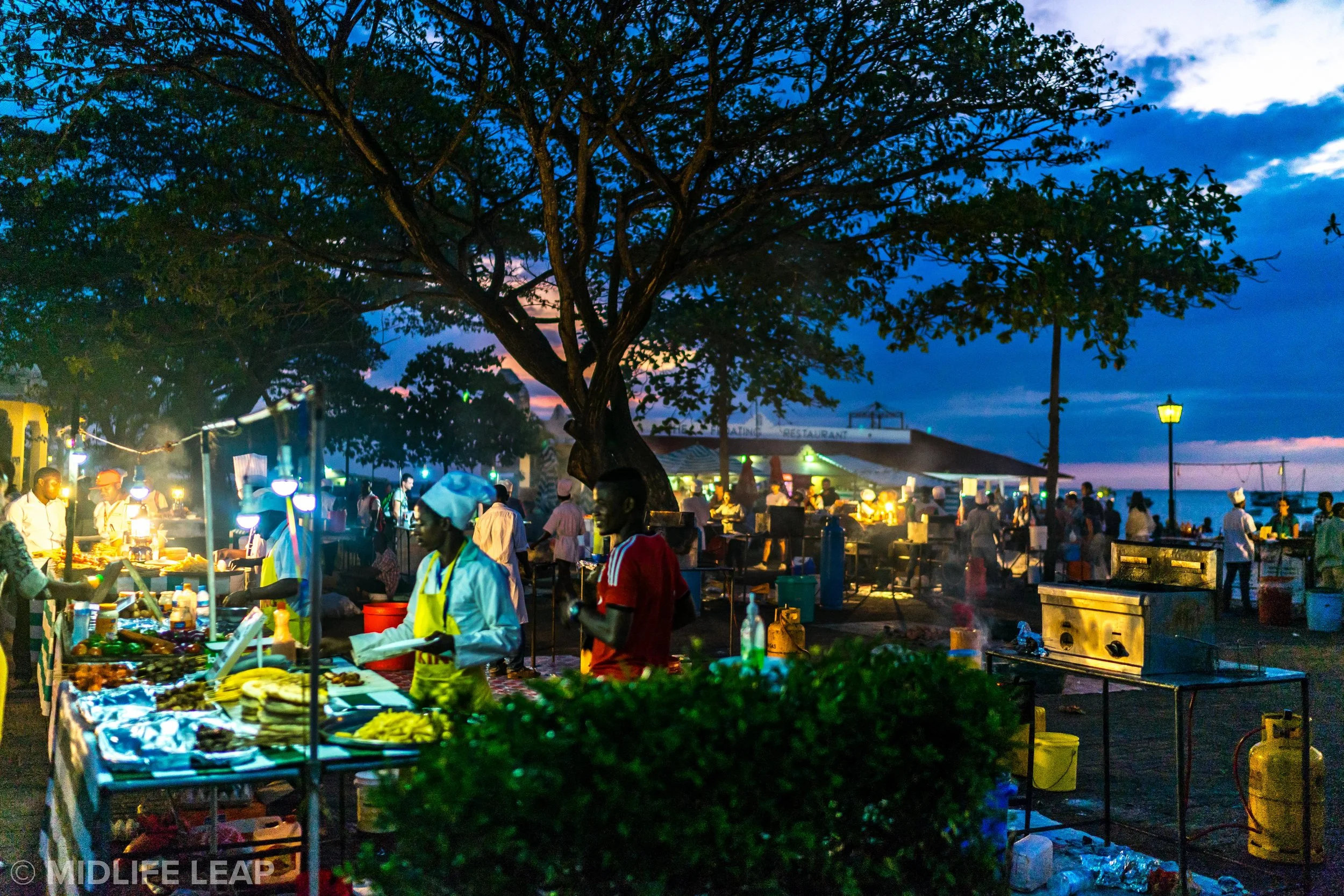 Forodhani Gardens Stone Town evening — waterfront food market sunset atmosphere