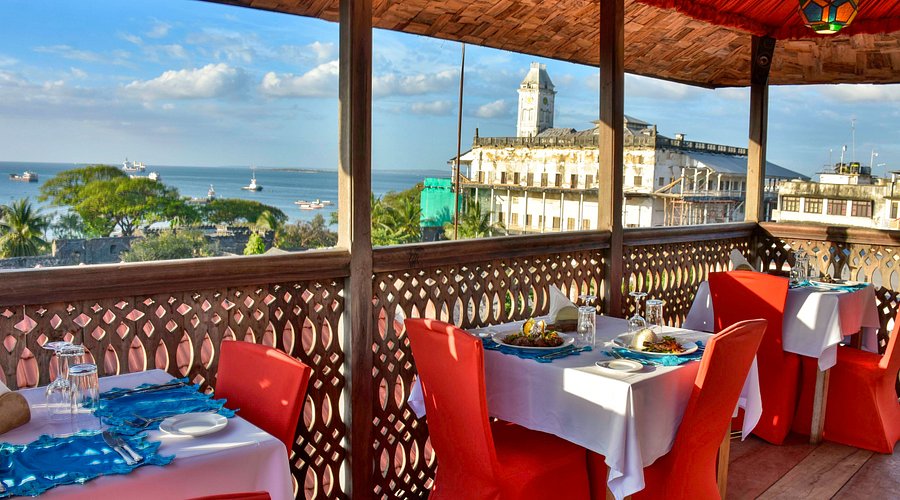 Stone Town Zanzibar rooftop restaurant — city views minarets dinner romantic