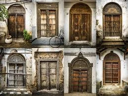 Intricately carved wooden door Stone Town Zanzibar UNESCO heritage Tanzania