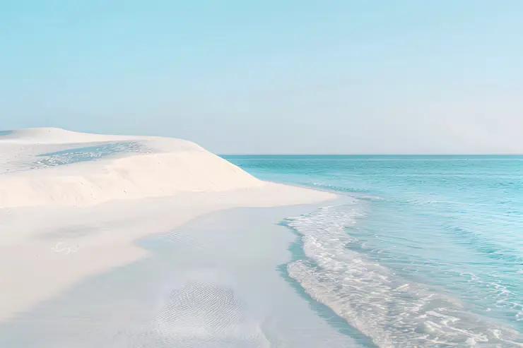 White sand beaches of Zanzibar with turquoise Indian Ocean water